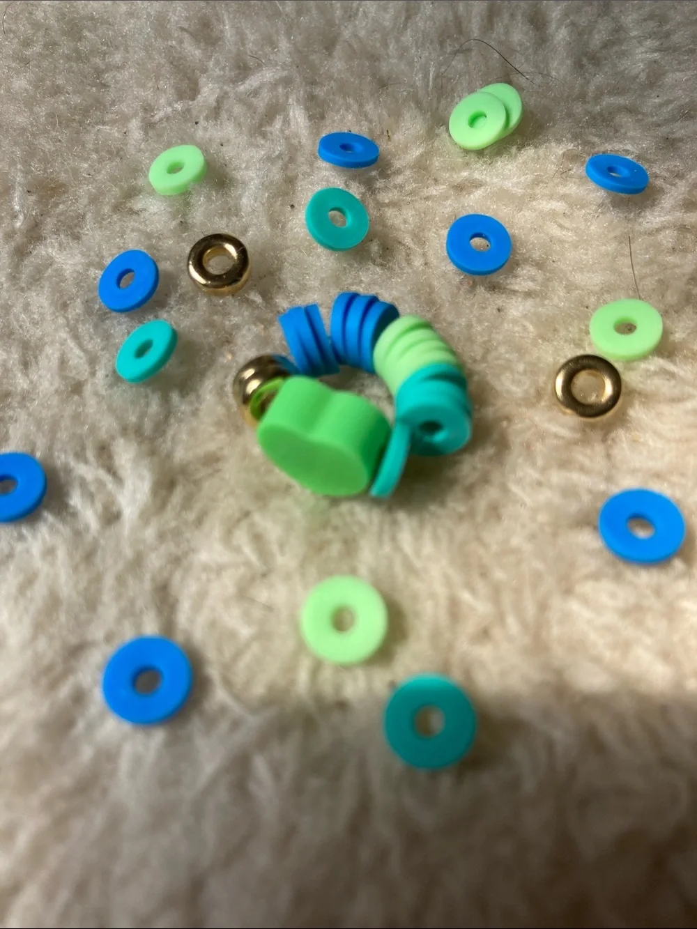 Green baby ring